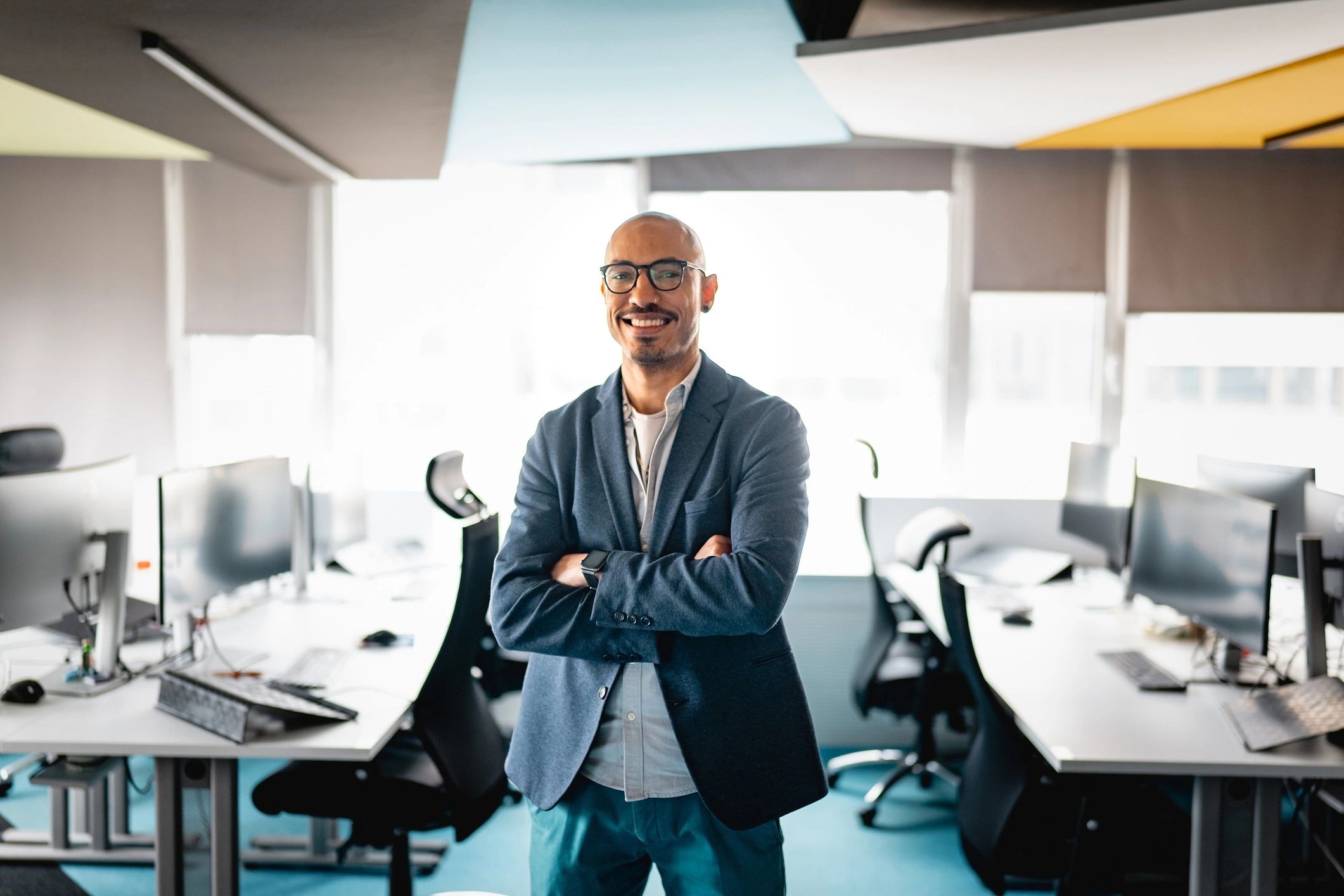 Confident leader in a moment of calm clarity — Lead Well executive and organizational wellness at Elitarc