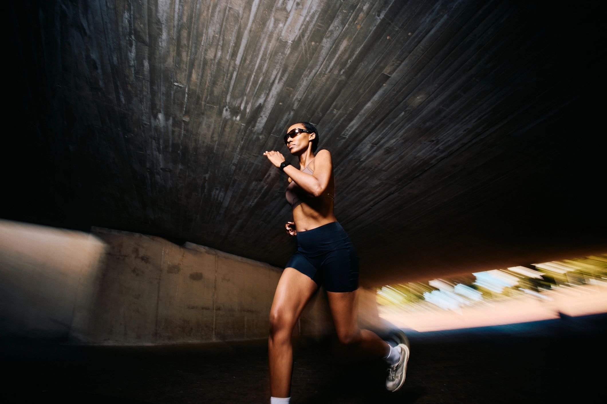 Runner in motion — Live Well wellness coaching and mindfulness at Elitarc